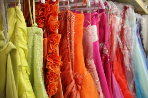 Rack,Of,Brightly,Coloured,Prom,Dresses